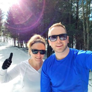 couple enjoys time on the mountain in the winter