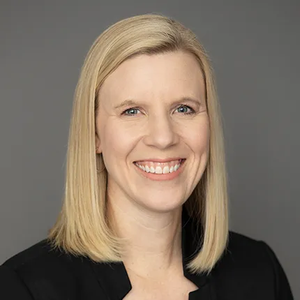 A headshot of Laura Coulombe