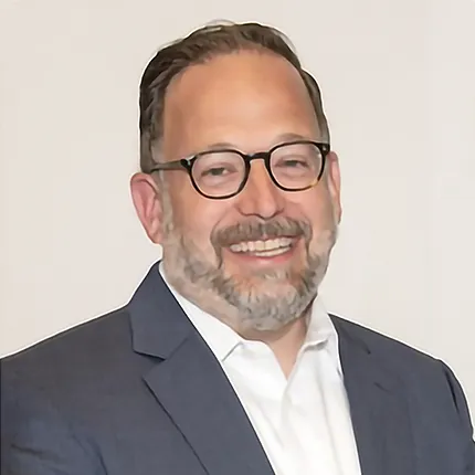 A headshot of Matthew Sticklin