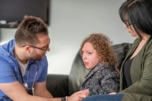 Child, her nurse, and parent